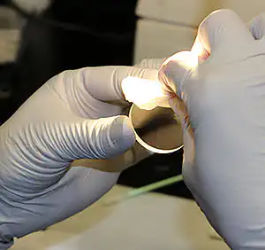 Figure 4: Evenly carefully wiping with the cleaning cloth.  Figure 4: Evenly carefully wiping with the cleaning cloth.