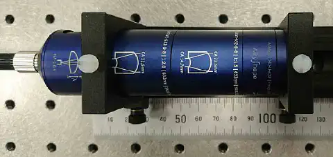 Figure 7) Experimental setup consisting of the following components: a|AspheriColl, two a|BeamExpander, a|AiryShape and a focusing lens (f = 200 mm). Figure 7) Experimental setup consisting of the following components: a|AspheriColl, two a|BeamExpander, a|AiryShape and a focusing lens (f = 200 mm).